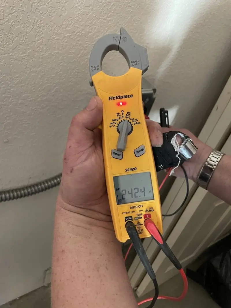 Voltage testing with clamp meter during Hot Tub / Pool Electrical Wiring in Waterloo